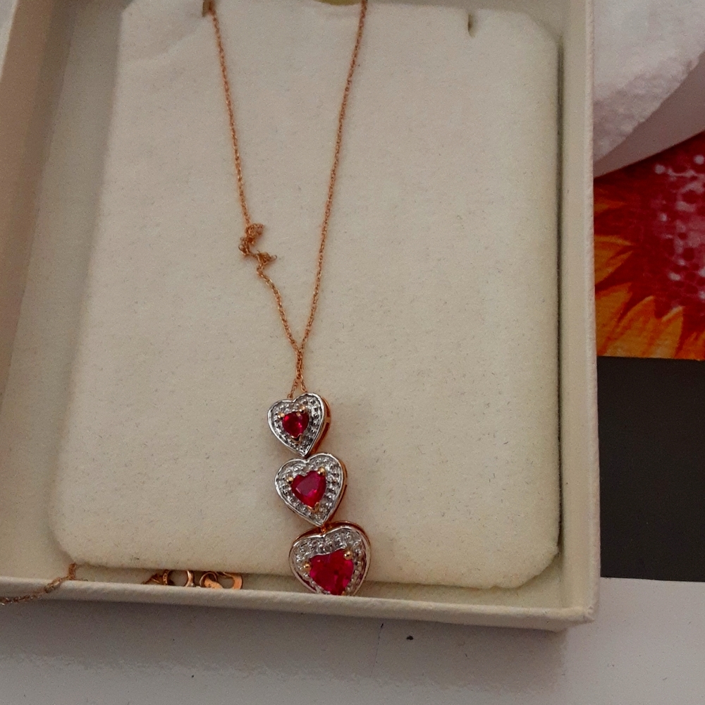 Women three heart shape gold necklace
